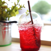 red soda with herbs