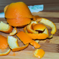 orange peels on a cutting board