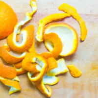 orange peels on a cutting board