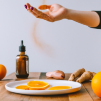 vertical smartphone-style photo of a wooden kitchen counter with simple home remedy ingredients arranged neatly, round white plate in foreground filled with fresh orange slices, a woman’s hand with neat polished nails sprinkling reddish powder over the slices mid-motion, powder particles visible in the air, behind the plate a bottle of apple cider vinegar, a small turmeric spice jar, and a baking soda box, casual kitchen setting, natural indoor lighting, soft shadows, realistic textures, health hack aesthetic, social media wellness post look, slight depth of field blur in background, photorealistic, warm tones --ar 9:16 --v 6 --style raw --quality 2