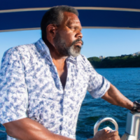 Black Male, 50s, with a beard, on a yacht