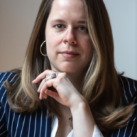 A square portrait professional picture of a 30 year old white female from head to chest dressed in a business suit. 2048 x 2048 high resolution