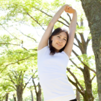 A woman exercising in the park